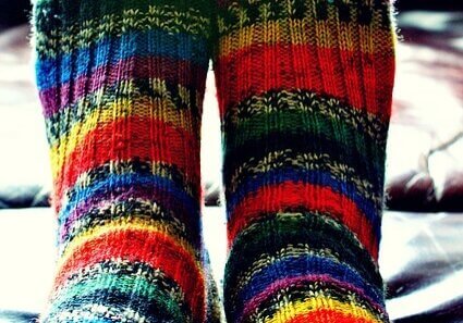 Feet wearing thick woolly socks